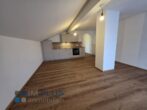 20260105_092333 - Komplett neu renovierte 2 Zi.-DG-Wohnung in bester Lage von Raubling- super vermietet mit 4,40 %!