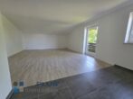 Außergewöhnlich schöne 2 Zimmer Wohnung in toller, ruhiger Sonnenlage - komplett neuer Zustand - TG - Wohnzimmer